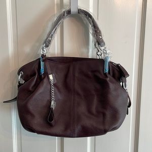 NWT HESHE genuine leather dark purple handbag with removable shoulder strap.